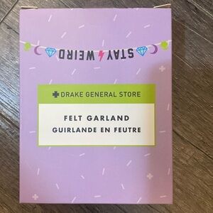 Drake General Store “Stay Weird” Felt Garland